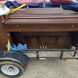 2  Antique Wurlitzer upright Pianos 