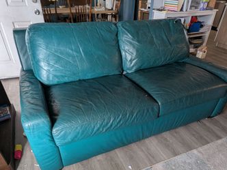 Green leather couch with queen pullout bed