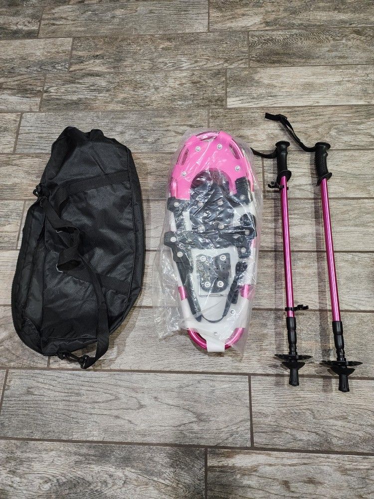 Pink snowshoes with poles and case