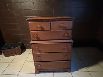 Tall wood dresser