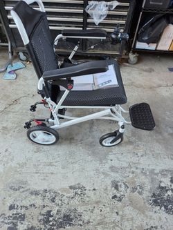 New Lightweight Electric Wheelchair 350 lb weight capacity Only weighs 42 lbs 20 mile range