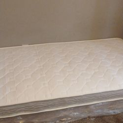 Twin box spring still in plastic