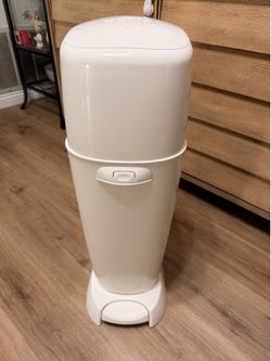 Used Diaper Genie (large) in white color.