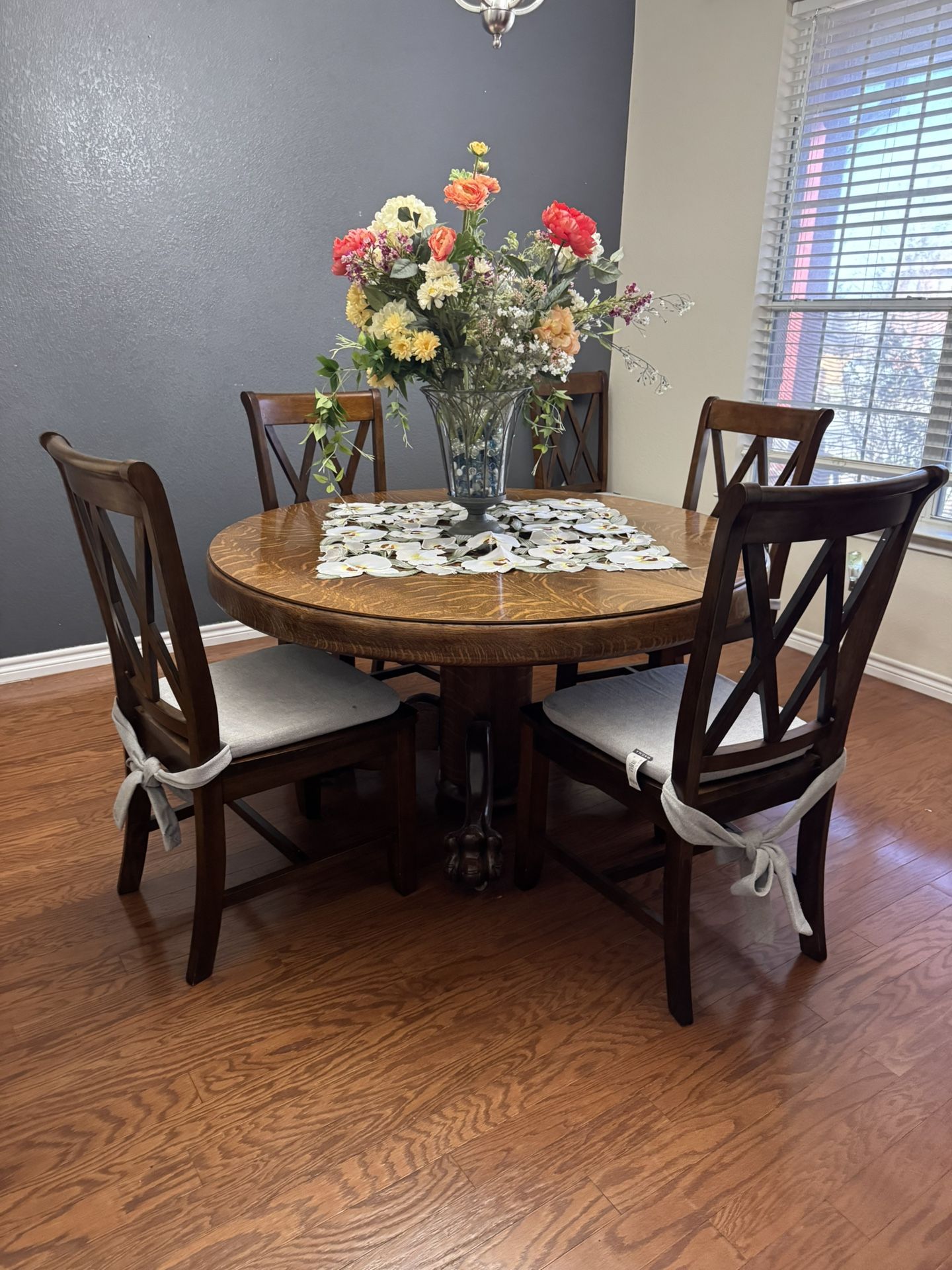 Antique round clawfoot table