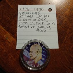 1(contact info removed) EISENHOWER SILVER DOLLAR COLORIZED MINT CONDITION IN CASING