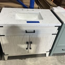 36” Bathroom Vanity in white , single sink soft close solid wood with vanity top in white  $599  Luke’s liquidations warehouse Address:  2434 N Forsyt