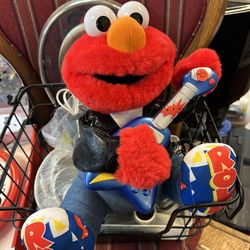 Vintage 1998 Rock and Roll Elmo plush toy by Tyco