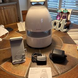 Brookstone Wireless Outdoor Speaker with 150 foot range universal dock. (Apple iPod not included.)