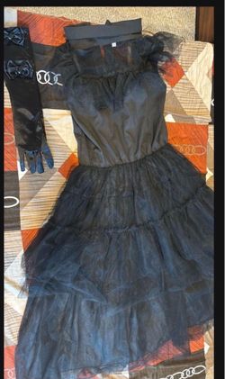 Brand new Wednesday girls costume only 7-9 years only