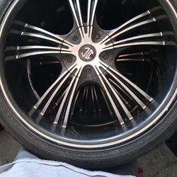 A SET OF WHEELS  W/ TIRES