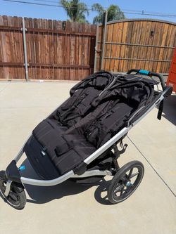 Thule double jogging stroller with accessories