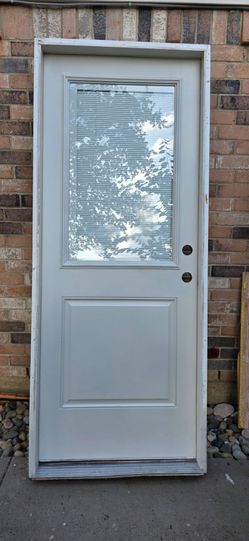 32x80 back door , framed with miniblinds , ready to install