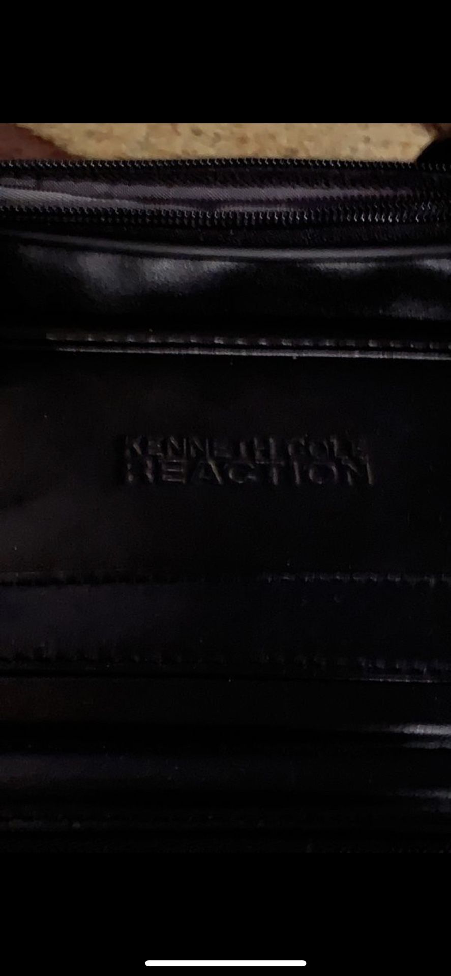 Kenneth Cole rolling suitcase