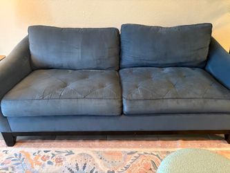 Blue suede sofa
