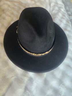 Black Hat wirh animal print accessory on rim