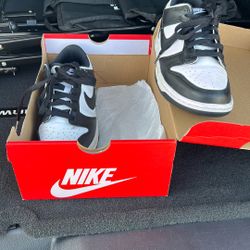 Worn Black And White Nike Dunks Low