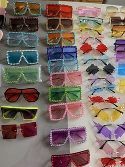 Over 100 pair of sunglasses 12-15 dollars each firm...