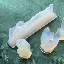 Lot Sabino, France, knife rest, Venus cherub Swan