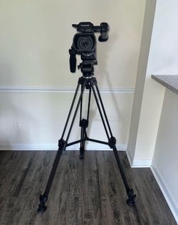 Professional-grade Panasonic AG-AC8 camcorder.