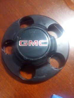 GMC truck black center cap USED