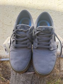 Used men’s size 8 Nike SB Portmore II Solar Canvas gray sneakers