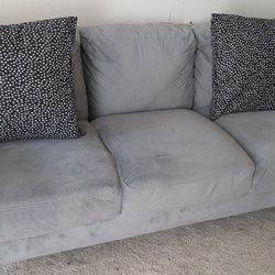 Couch/ Sofa With White Cushions 