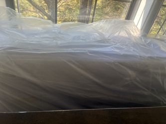 Full Queen size bed with bed frame and drawer below the bed