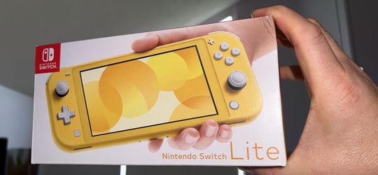 Yellow Nintendo Switch Lite - brand new - never removed from box