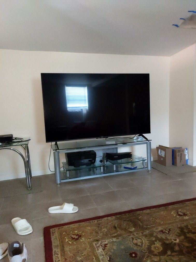 75 In TV. With TV Stand