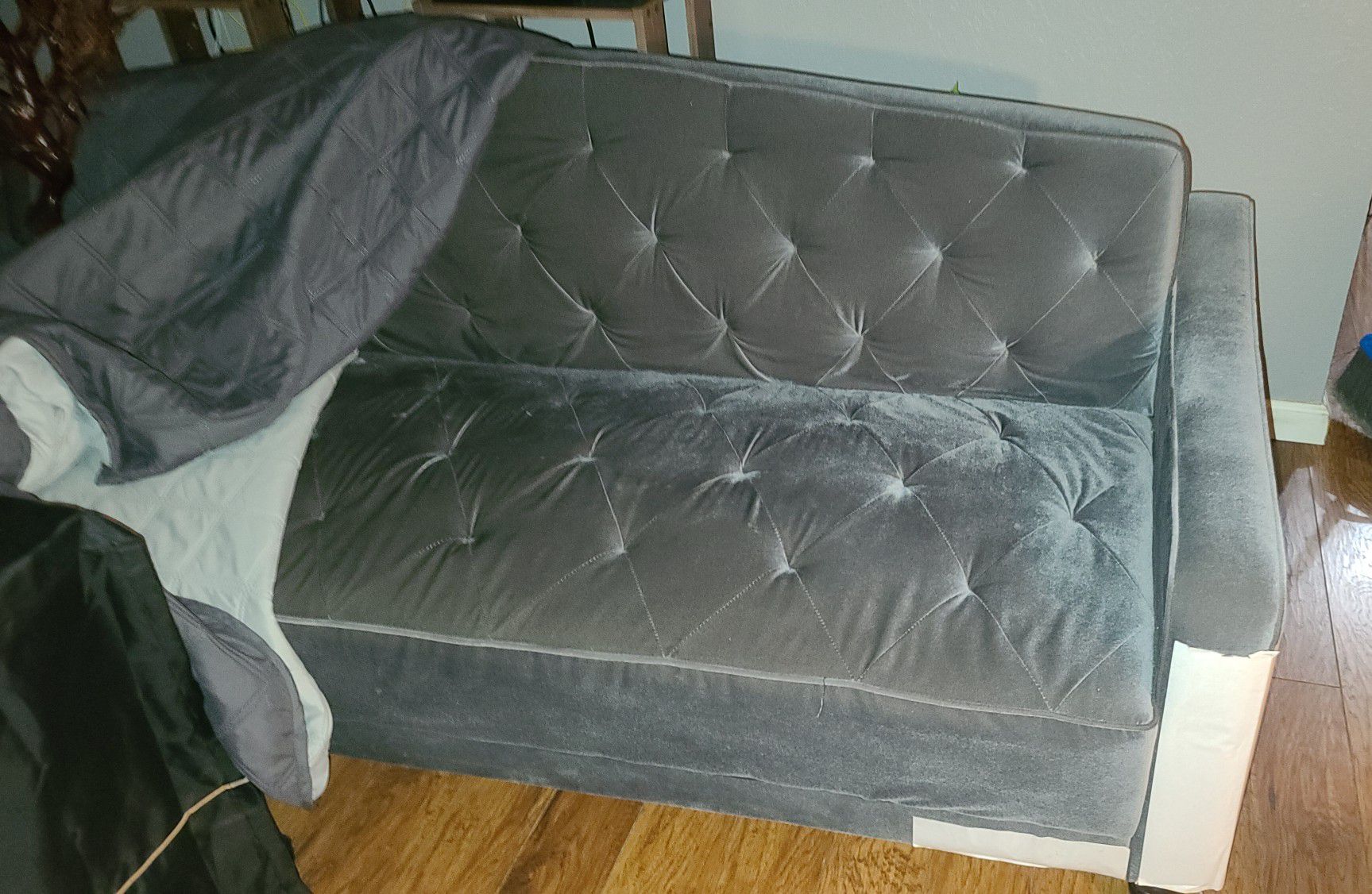 Vintage looking grey sleeper couch