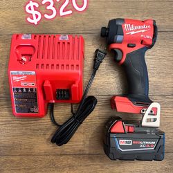 Milwaukee M18 Impact Drill w/ Charger and 5ah Battery 