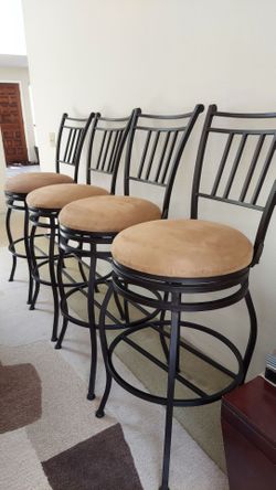 4 barstools, swiveling chairs, $250/set