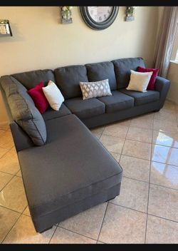 Beautiful Charcoal grey sectional couch from Living Spaces LIKE NEW