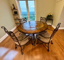 High End Round Tuscan Dining Set with 4 Rolling Caster Chairs