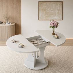White extendable table with 6-8 people