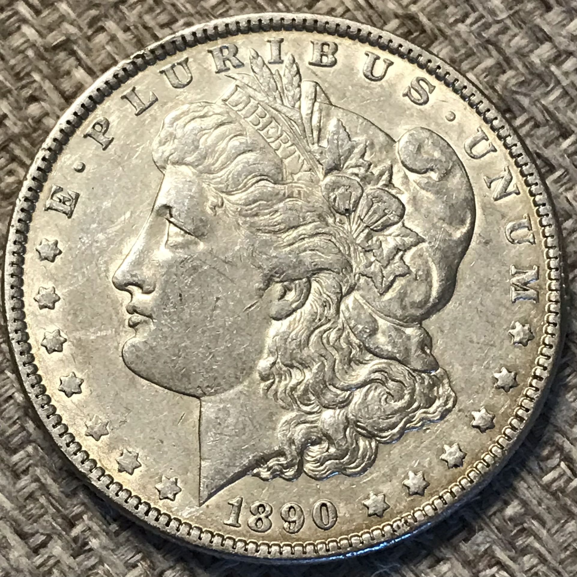 1890 Morgan Silver Dollar.