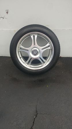American Racing rims ..4 new rims comes with new tires size 17...used 2 months