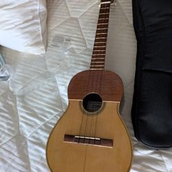 Venezuelan Quatro Guitar String Instrument.  Very Nice Condition.  Teca & Pine Wood. 
