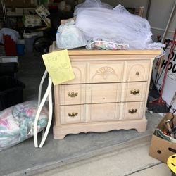 Babies crib with a changing table and all the accessories for the bed