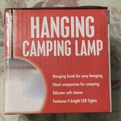 New (open box to show images of what the light looks like)  Hanging hook for easy hanging Ideal companion for camping Silicone soft sleeve Features 4 