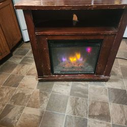 31-in Long 33 In Wide Mahogany And Fair Electric Fireplace Real Flame The Standings In Good Condition The Fireplace Works