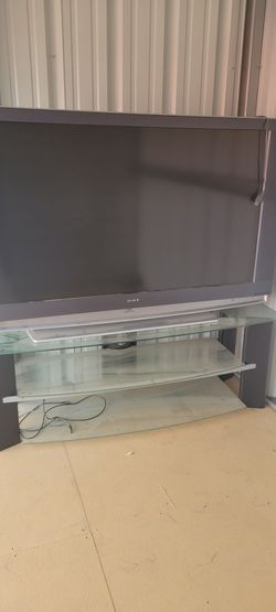 Large TV with glass stand