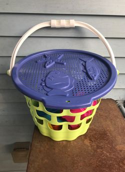 Cute basket of sand toys