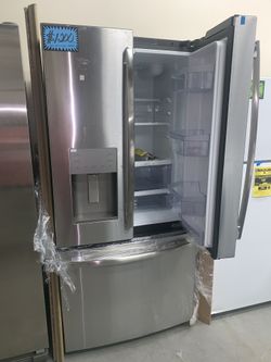 New GE stainless steel 33in. Counter depth french doors refrigerator with 1 year manufacturer warranty