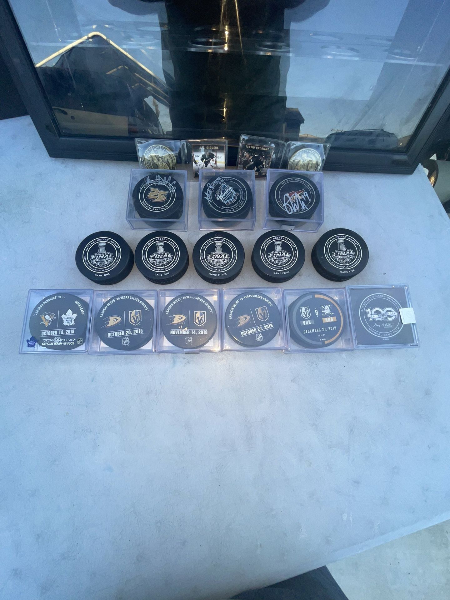 Hockey Puck Wall Mount Stand With Several Hi my Pucks Some Signed Some CERTS