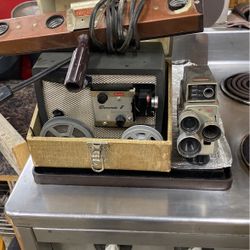 8 Mm Camera And Projector. With Light Bar