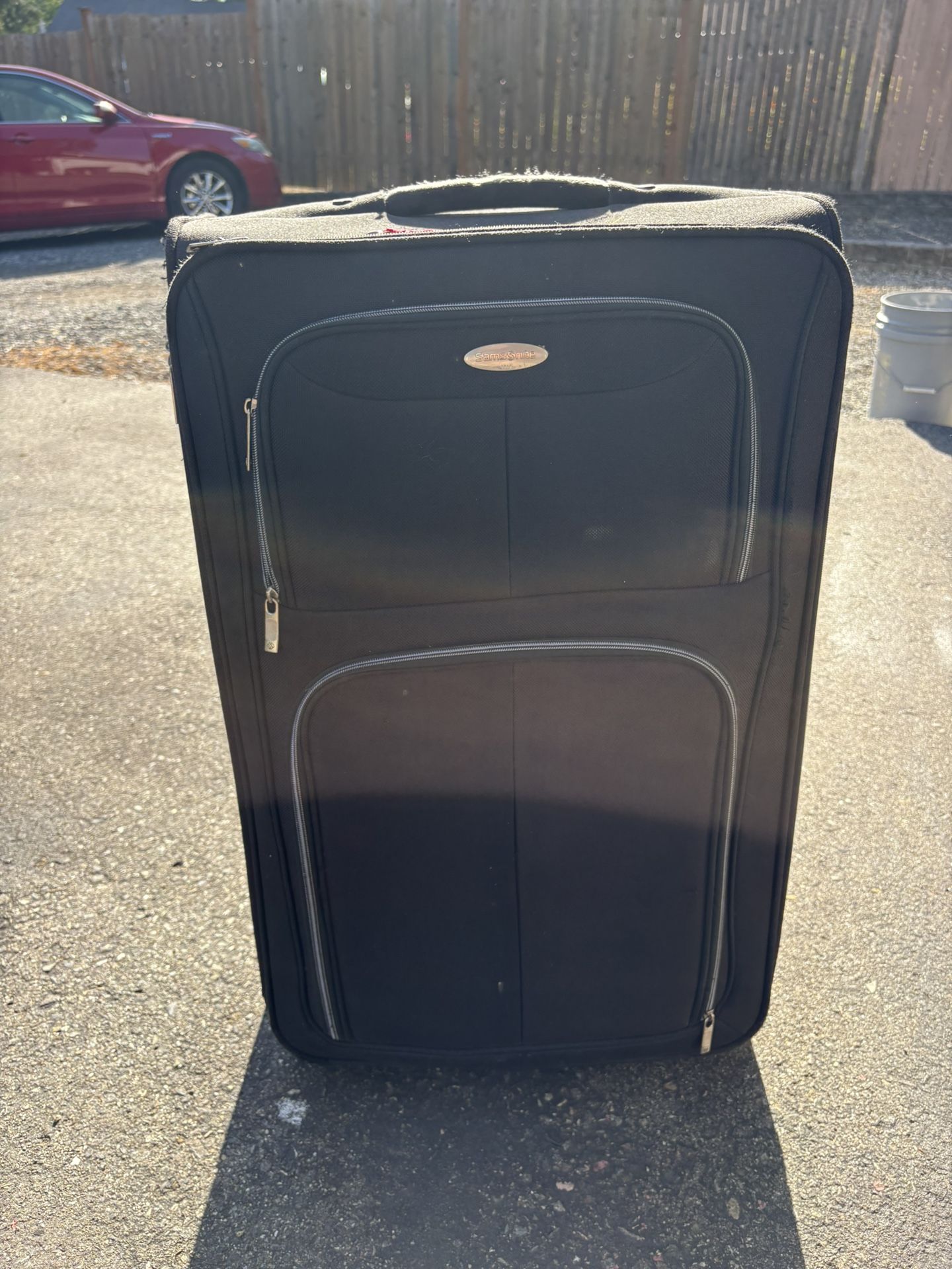 Samsonite Large Rolling Suitcase – Durable & Spacious