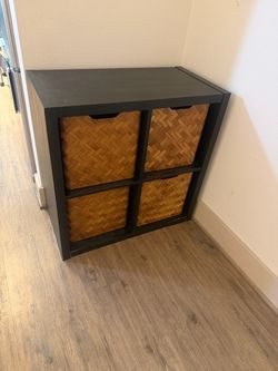 Black cube with boxes from ikea