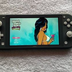 NINTENDO SWITCH LITE with 100 SWITCH GAMES and 7500 RETRO CLASSIC GAMES