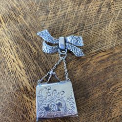 Vintage Sterling silver handbag brooch circa 1970. Intricate work.